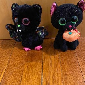 Potion the Cat and Dart the Bat